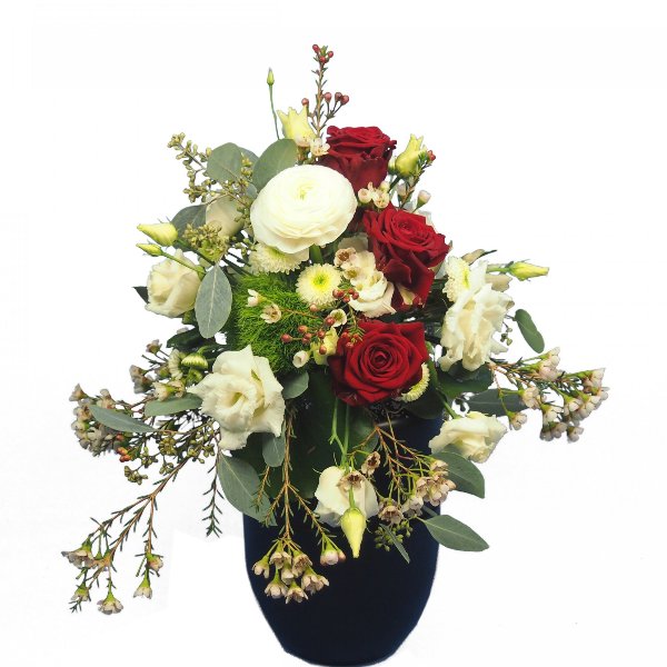 Urnenschmuck mit roten Rosen und passenden weißen Blumen Bild 2