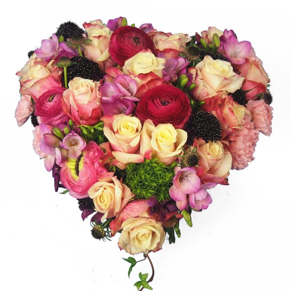 Herzform gesteckt mit Blumen in rosa-magenta-pink Bild 1